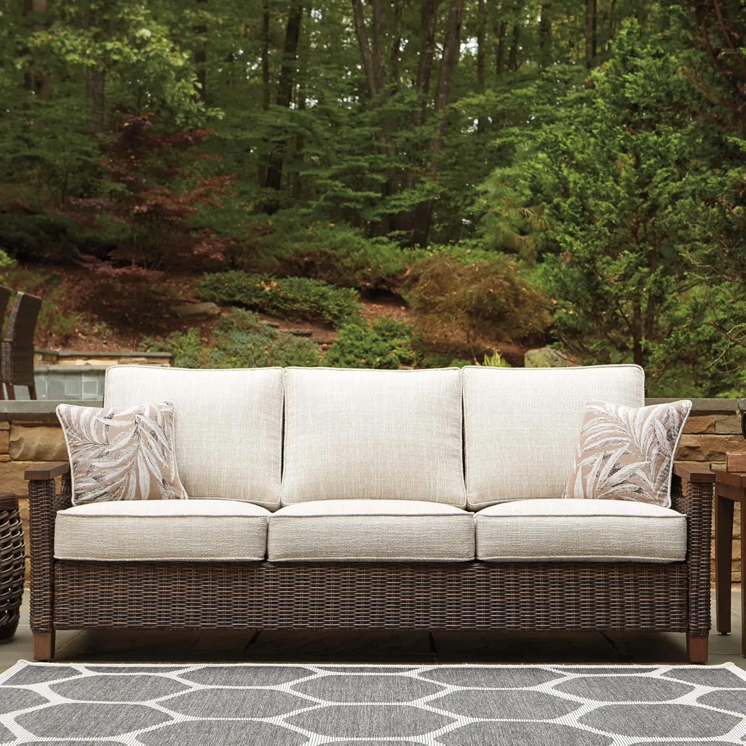 Signature Design by Ashley Paradise Trail Outdoor Patio Sofa with Cushion and 2 Pillows, Brown & Beige