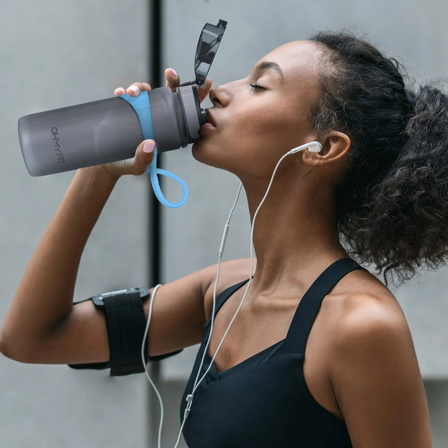 Tritan Sports Water Bottle with Magnetic Silicone Carry Strap & One Click Open Cap - Magnetic Drink Holder for Metal Equipment - Bottle w/Straps for Backpack, Belt & More (18oz, Sky Blue)